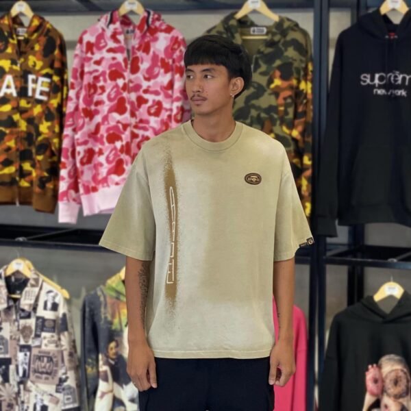 BRANDNEW AAPE BY *A BATHING APE® Spray Print Relaxed Fit Sand Brown Tee (Medium)